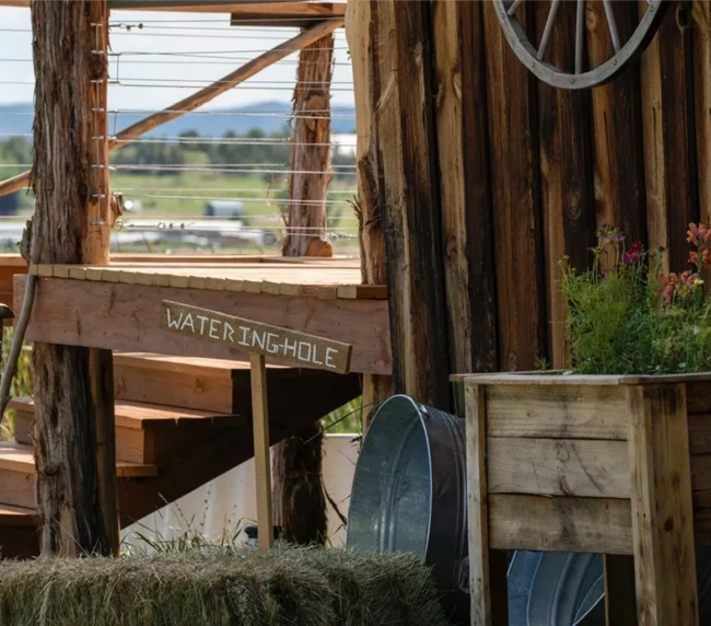 Rustic wooden deck and barn details at Three Willows Ranch wedding venue in Colorado