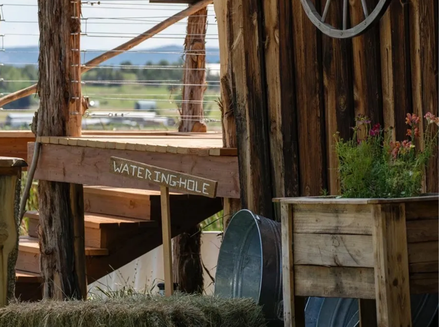 Rustic wooden deck and barn details at Three Willows Ranch wedding venue in Colorado