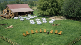 Outdoor event near rustic barn