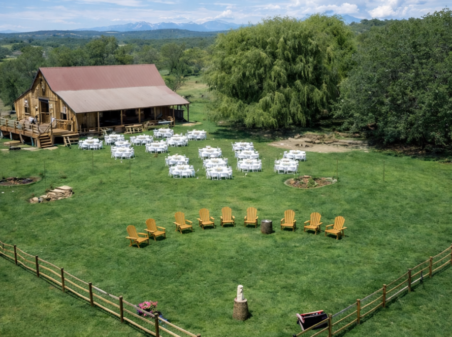 Outdoor event near rustic barn