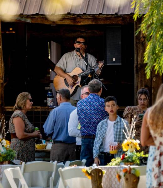 Live acoustic music performance during an outdoor event at Three Willows Ranch rustic barn venue in Bayfield Colorado